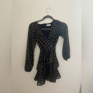 Altered state black with gold dots dress.